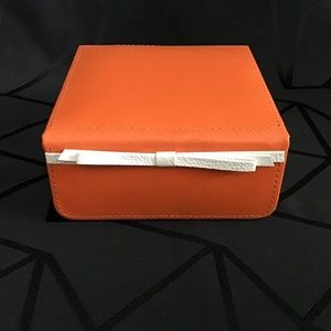 NWOT Faux Leather and Suede jewelry box with white ribbon detail on front